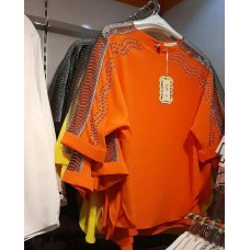 Stoned orange coloured turkey blouse with netted soft wire gauzed mid arm design