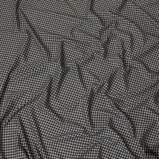 White and black blended suiting fabric in checks design