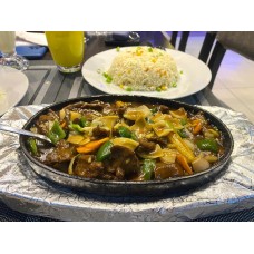 Beef in hot plate and steamed rice