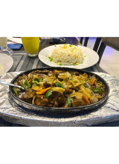 Beef in hot plate and steamed rice